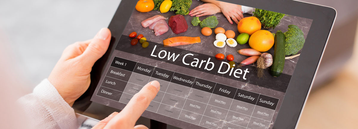 Low carb diet planner on the screen of a tablet PC