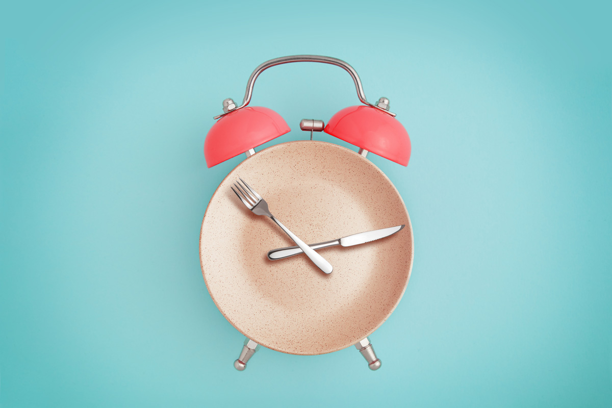 clock with cutlery as pointer