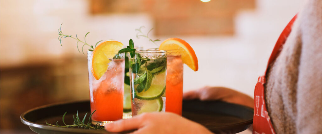 3 cocktails being served